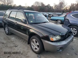 2003 Subaru Forester XS with VIN JF1SG65623H724854, listed as a Copart auction lot 82579774 with 176,986 mi miles and Salvage Title. Bid and sale history available at carsss.com. Image 4.