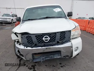2013 Nissan Titan PRO-4X with VIN 1N6BA0EC9DN301669, listed as a IAAI auction lot 41868397 with 171,085 mi miles. Bid and sale history available at carsss.com. Image 12.