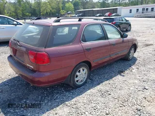 1999 Suzuki Esteem GL with VIN JS2GB41W4X5160663, listed as a IAAI auction lot 42056553 with 91,057 mi miles and . Bid and sale history available at DreamBid. Image 4.