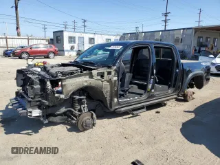 2023 Toyota Tacoma SR z VIN 3TMCZ5AN7PM568554, wystawiony jako Copart lot #52556565 z przebiegiem Nie podano mil oraz Szkoda całkowita • Salvage title. Historia ofert i sprzedaży dostępna na DreamBid. Obrazek 1.