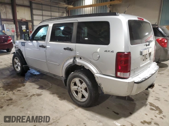 2010 Dodge Nitro SXT z VIN 1D4PU5GK7AW112562, wystawiony jako Copart lot #45113225 z przebiegiem 150 183 mil mil oraz Szkoda całkowita • Salvage title. Historia ofert i sprzedaży dostępna na DreamBid. Obrazek 2.