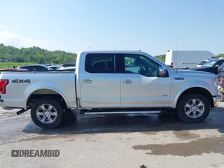 2015 Ford F-150 XLT with VIN 1FTEW1EG8FKE61864, listed as a IAAI auction lot 42120436 with 129,448 mi miles and . Bid and sale history available at DreamBid. Image 14.