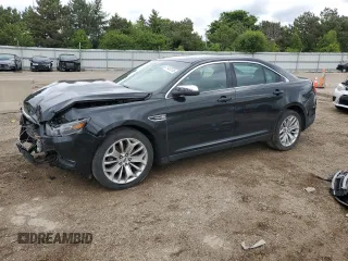 2015 Ford Taurus Limited z VIN 1FAHP2F87FG102618, wystawiony jako Copart lot #57427515 z przebiegiem 196 895 mil mil oraz Szkoda całkowita • Salvage title. Historia ofert i sprzedaży dostępna na DreamBid. Obrazek 1.