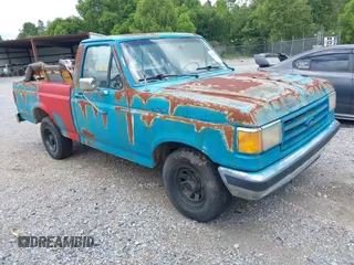 1990 Ford F-150 with VIN 1FTDF15N5LNB34505, listed as a IAAI auction lot 42825817 with 406,488 mi miles and . Bid and sale history available at DreamBid. Image 1.
