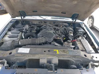 2005 Ford Explorer Sport Trac XLS z VIN 1FMZU67K05UB36386, wystawiony jako IAAI lot #42449876 z przebiegiem 161 181 mil mil oraz . Historia ofert i sprzedaży dostępna na DreamBid. Obrazek 10.