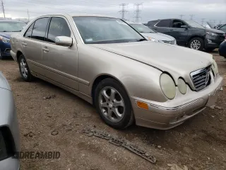 2002 Mercedes-Benz E-Class with VIN WDBJF65J12B463150, listed as a Copart auction lot 74434654 with 215,883 mi miles and Salvage Title. Bid and sale history available at carsss.com. Image 4.