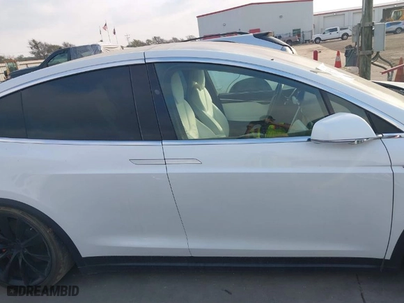 2019 Tesla Model X P100D with VIN 5YJXCBE44KF180844, listed as a IAAI auction lot 41807432 with NaN miles. Bid and sale history available at carsss.com. Image 13.