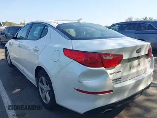 2015 Kia Optima LX with VIN KNAGM4A76F5663782, listed as a IAAI auction lot 42162942 with 128,321 mi miles. Bid and sale history available at carsss.com. Image 3.