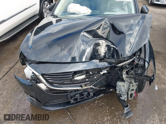 2016 Mazda 6 i Grand Touring with VIN JM1GJ1W54G1454115, listed as a IAAI auction lot 41203298 with 104,632 mi miles and . Bid and sale history available at DreamBid. Image 10.