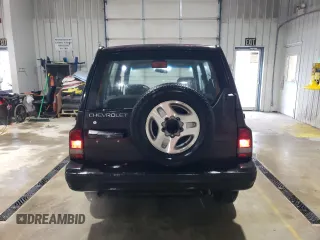 1998 Chevrolet Tracker z VIN 2CNBJ1362W6919635, wystawiony jako Copart lot #56894355 z przebiegiem 140 298 mil mil oraz Szkoda całkowita • Salvage title. Historia ofert i sprzedaży dostępna na DreamBid. Obrazek 6.