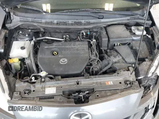 2014 Mazda 5 Touring with VIN JM1CW2CL7E0167945, listed as a IAAI auction lot 41624435 with 167,736 mi miles. Bid and sale history available at carsss.com. Image 10.