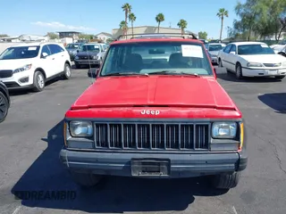 1996 Jeep Cherokee Sport with VIN 1J4FT68S0TL225719, listed as a IAAI auction lot 42121351 with 237,602 mi miles and . Bid and sale history available at DreamBid. Image 6.