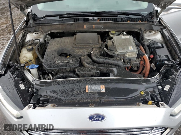 2016 Ford Fusion SE Hybrid z VIN 3FA6P0LUXGR350997, wystawiony jako Copart lot #62301825 z przebiegiem 267 537 mil mil oraz Szkoda całkowita • Salvage title. Historia ofert i sprzedaży dostępna na DreamBid. Obrazek 11.