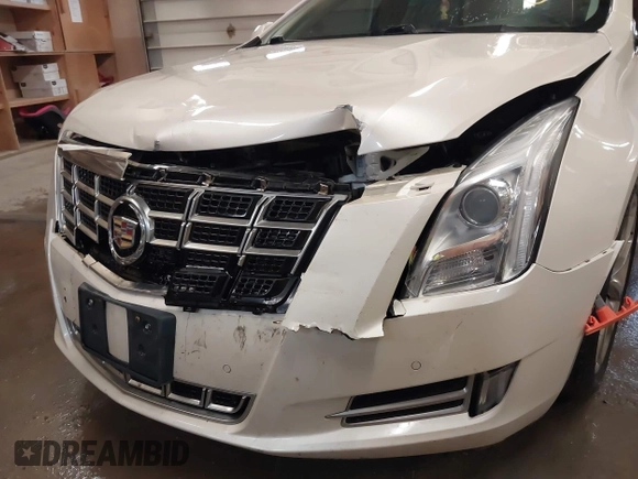 2013 Cadillac XTS Luxury with VIN 2G61R5S37D9152726, listed as a IAAI auction lot 41718331 with 88,189 mi miles and . Bid and sale history available at DreamBid. Image 6.