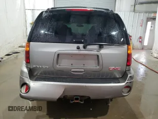 2007 GMC Envoy SLE z VIN 1GKDT13S172268778, wystawiony jako Copart lot #86169804 z przebiegiem 109 164 mil mil oraz Szkoda całkowita • Salvage title. Historia ofert i sprzedaży dostępna na DreamBid. Obrazek 6.