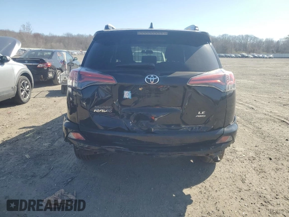 2016 Toyota RAV4 LE with VIN 2T3BFREV8GW433295, listed as a Copart auction lot 53089495 with 127,670 mi miles and Salvage Title. Bid and sale history available at DreamBid. Image 6.