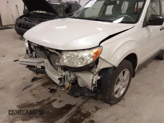 2012 Subaru Forester X with VIN JF2SHBBCXCH433191, listed as a IAAI auction lot 41964271 with 146,176 mi miles and . Bid and sale history available at DreamBid. Image 6.