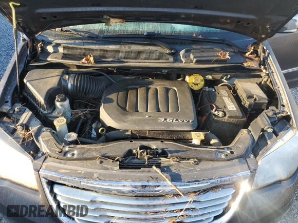 2016 Chrysler Town & Country Touring z VIN 2C4RC1CGXGR222915, wystawiony jako Copart lot #74758564 z przebiegiem Nie podano mil oraz Nie do naprawy • Non repairable. Historia ofert i sprzedaży dostępna na DreamBid. Obrazek 12.