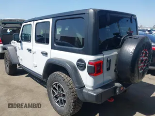 2024 Jeep Wrangler Rubicon with VIN 1C4PJXFG1RW300794, listed as a IAAI auction lot 42784578 with 22,652 mi miles and . Bid and sale history available at DreamBid. Image 3.