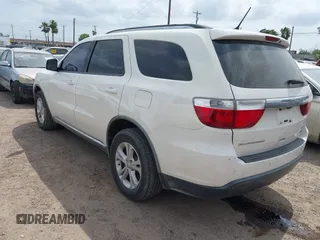 2011 Dodge Durango Crew with VIN 1D4RD4GG6BC730344, listed as a IAAI auction lot 42154714 with 211,903 mi miles and . Bid and sale history available at carsss.com. Image 3.