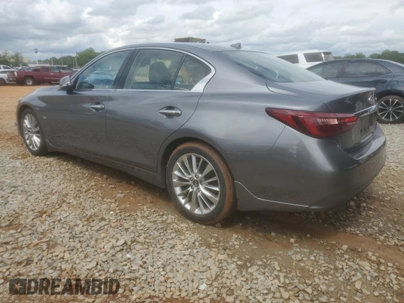 2019 Infiniti Q50 Luxe with VIN JN1EV7AP6KM517944, listed as a Copart auction lot 56942655 with 94,883 mi miles and Salvage title. Bid and sale history available at DreamBid. Image 2.