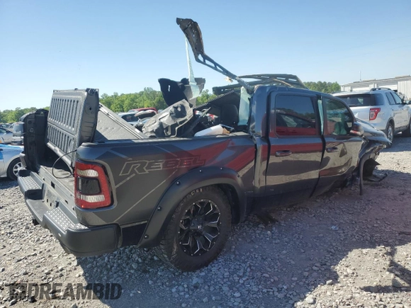 2022 Ram 1500 Rebel z VIN 1C6SRFLT1NN112993, wystawiony jako Copart lot #53305985 z przebiegiem Nie podano mil oraz Szkoda całkowita • Salvage title. Historia ofert i sprzedaży dostępna na DreamBid. Obrazek 3.