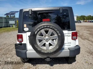 2018 Jeep Wrangler JK Unlimited Sahara with VIN 1C4HJWEG7JL910656, listed as a Copart auction lot 73414244 with 50,519 mi miles and Salvage Title. Bid and sale history available at carsss.com. Image 6.