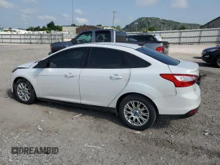 2012 Ford Focus SE z VIN 1FAHP3F2XCL310660, wystawiony jako Copart lot #60217625 z przebiegiem 208 807 mil mil oraz Szkoda całkowita • Salvage title. Historia ofert i sprzedaży dostępna na DreamBid. Obrazek 2.