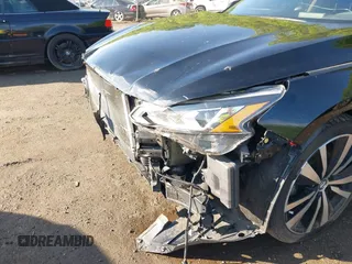 2019 Nissan Altima SR z VIN 1N4BL4CW1KN311083, wystawiony jako IAAI lot #42155520 z przebiegiem 92 545 mil mil oraz . Historia ofert i sprzedaży dostępna na DreamBid. Obrazek 22.