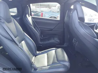 2018 Tesla Model X 75D with VIN 5YJXCBE22JF124270, listed as a IAAI auction lot 41909734 with 92,553 mi miles. Bid and sale history available at carsss.com. Image 8.