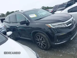 2019 Honda Pilot Touring 7-Passenger z VIN 5FNYF5H66KB027960, wystawiony jako IAAI lot #41863212 z przebiegiem 114 615 mil mil oraz . Historia ofert i sprzedaży dostępna na DreamBid. Obrazek 13.