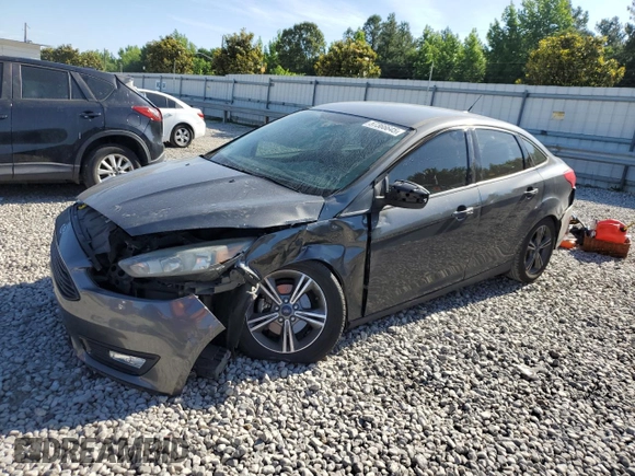 2016 Ford Focus SE with VIN 1FADP3FE8GL381855, listed as a Copart auction lot 57366645 with 104,709 mi miles and Salvage title. Bid and sale history available at DreamBid. Image 1.
