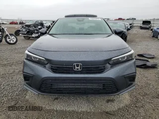 2024 Honda Civic EX z VIN 2HGFE1F79RH336732, wystawiony jako Copart lot #43025295 z przebiegiem 5 468 mil mil oraz Szkoda całkowita • Salvage title. Historia ofert i sprzedaży dostępna na DreamBid. Obrazek 5.