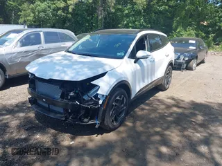 2025 Kia Sportage SX-Prestige with VIN 5XYK5CDF2SG301912, listed as a IAAI auction lot 42553193 with 1,816 mi miles and . Bid and sale history available at DreamBid. Image 19.