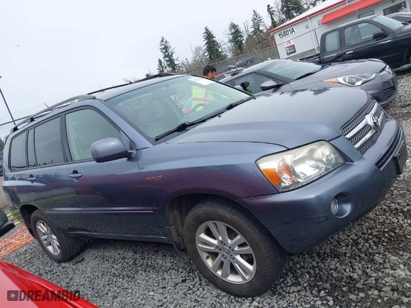 2006 Toyota Highlander Hybrid with VIN JTEEW21A260023243, listed as a IAAI auction lot 41778209 with 230,228 mi miles. Bid and sale history available at carsss.com. Image 13.