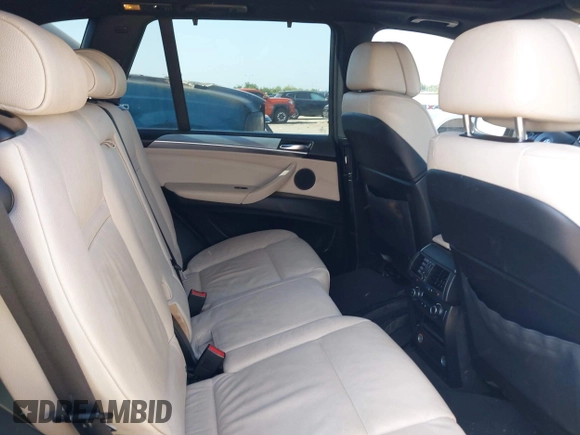 2012 BMW X5 35d with VIN 5UXZW0C51CL669957, listed as a IAAI auction lot 42230292 with 102,305 mi miles and . Bid and sale history available at DreamBid. Image 8.
