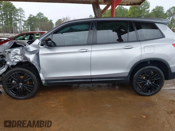 2021 Honda Passport Sport with VIN 5FNYF7H26MB014556, listed as a IAAI auction lot 41683680 with 97,829 mi miles and . Bid and sale history available at DreamBid. Image 14.