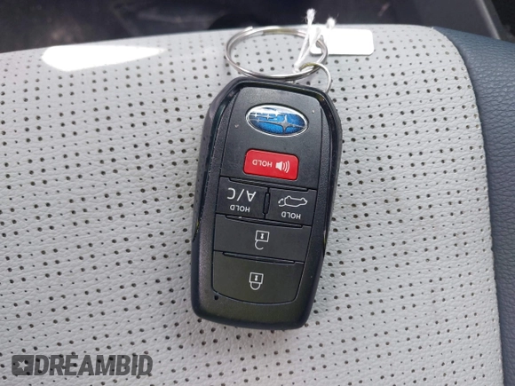 2024 Subaru Solterra Premium z VIN JTMABABA6RA053657, wystawiony jako IAAI lot #42451075 z przebiegiem 13 805 mil mil oraz . Historia ofert i sprzedaży dostępna na DreamBid. Obrazek 11.