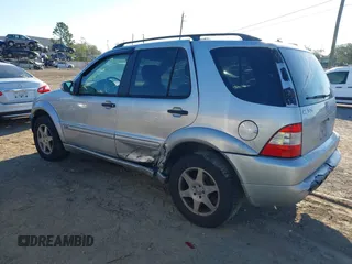 2003 Mercedes-Benz M-Class 3.2L with VIN 4JGAB54E03A383496, listed as a IAAI auction lot 41327756 with 162,973 mi miles. Bid and sale history available at carsss.com. Image 3.