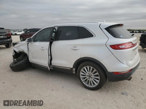 2019 Lincoln MKC Standard with VIN 5LMCJ1D95KUL45392, listed as a Copart auction lot 82561394 with 104,748 mi miles and Salvage Title. Bid and sale history available at DreamBid. Image 2.