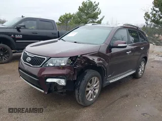 2013 Kia Sorento SX with VIN 5XYKWDA20DG370685, listed as a IAAI auction lot 42084027 with 1 mi miles. Bid and sale history available at carsss.com. Image 2.