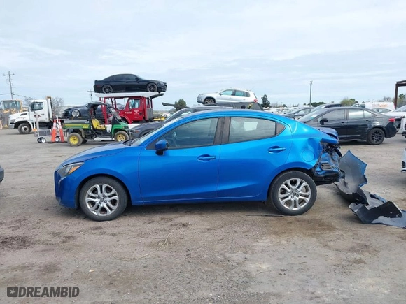 2017 Toyota Yaris iA with VIN 3MYDLBYV7HY175918, listed as a IAAI auction lot 41866877 with 86,564 mi miles. Bid and sale history available at carsss.com. Image 14.