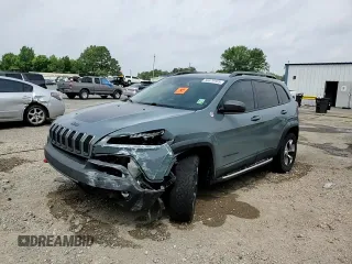 2014 Jeep Cherokee Trailhawk z VIN 1C4PJMBS4EW156550, wystawiony jako Copart lot #56870165 z przebiegiem 100 184 mil mil oraz Szkoda całkowita • Salvage title. Historia ofert i sprzedaży dostępna na DreamBid. Obrazek 14.