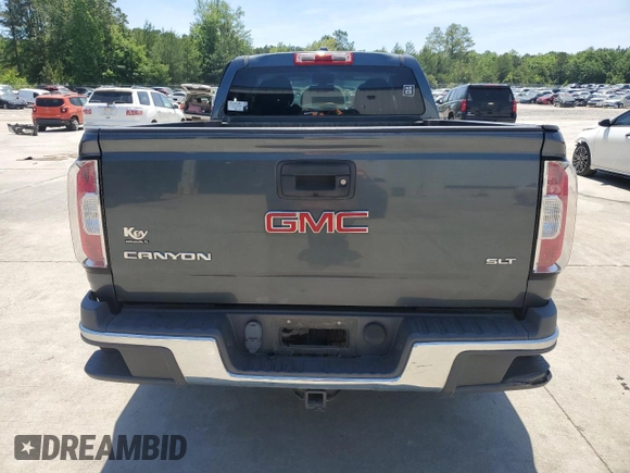 2015 GMC Canyon 4WD SLT z VIN 1GTG6CE30F1182562, wystawiony jako Copart lot #55382605 z przebiegiem 97 183 mil mil oraz Szkoda całkowita • Salvage title. Historia ofert i sprzedaży dostępna na DreamBid. Obrazek 6.