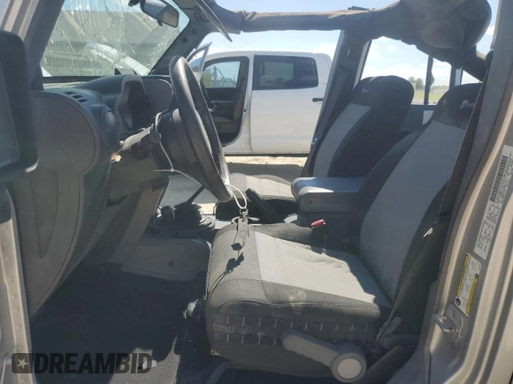 2007 Jeep Wrangler Unlimited Sahara with VIN 1J4GA59147L207482, listed as a Copart auction lot 55666615 with 151,525 mi miles and Salvage title. Bid and sale history available at DreamBid. Image 7.