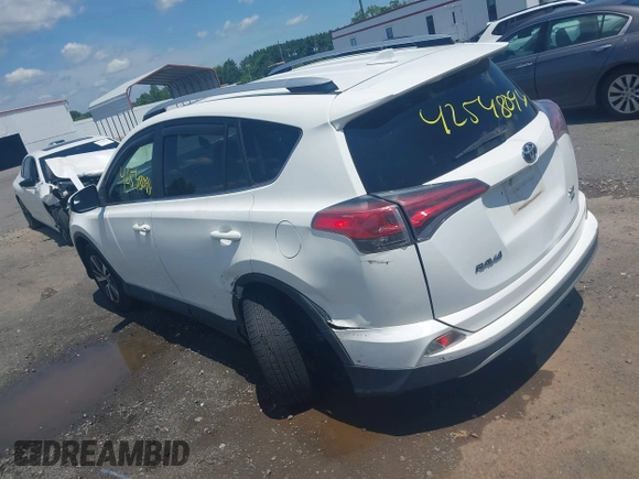 2016 Toyota RAV4 XLE with VIN JTMRFREV0GJ073114, listed as a IAAI auction lot 42548094 with 119,431 mi miles and . Bid and sale history available at DreamBid. Image 3.