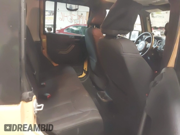 2014 Jeep Wrangler Unlimited Sport with VIN 1C4BJWDG2EL134143, listed as a IAAI auction lot 41957046 with 151,529 mi miles and . Bid and sale history available at DreamBid. Image 8.