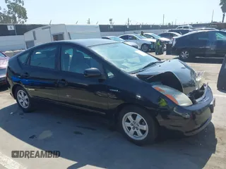 2007 Toyota Prius with VIN JTDKB20UX73228033, listed as a IAAI auction lot 41851668 with 242,138 mi miles. Bid and sale history available at carsss.com. Image 13.