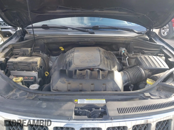 2013 Jeep Grand Cherokee Overland with VIN 1C4RJECT2DC546634, listed as a IAAI auction lot 41180807 with 111,897 mi miles. Bid and sale history available at carsss.com. Image 10.