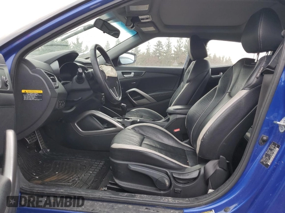2013 Hyundai Veloster Turbo z VIN KMHTC6AEXDU134283, wystawiony jako Copart lot #39048284 z przebiegiem 97 988 mil mil oraz Szkoda całkowita • Salvage title. Historia ofert i sprzedaży dostępna na DreamBid. Obrazek 7.